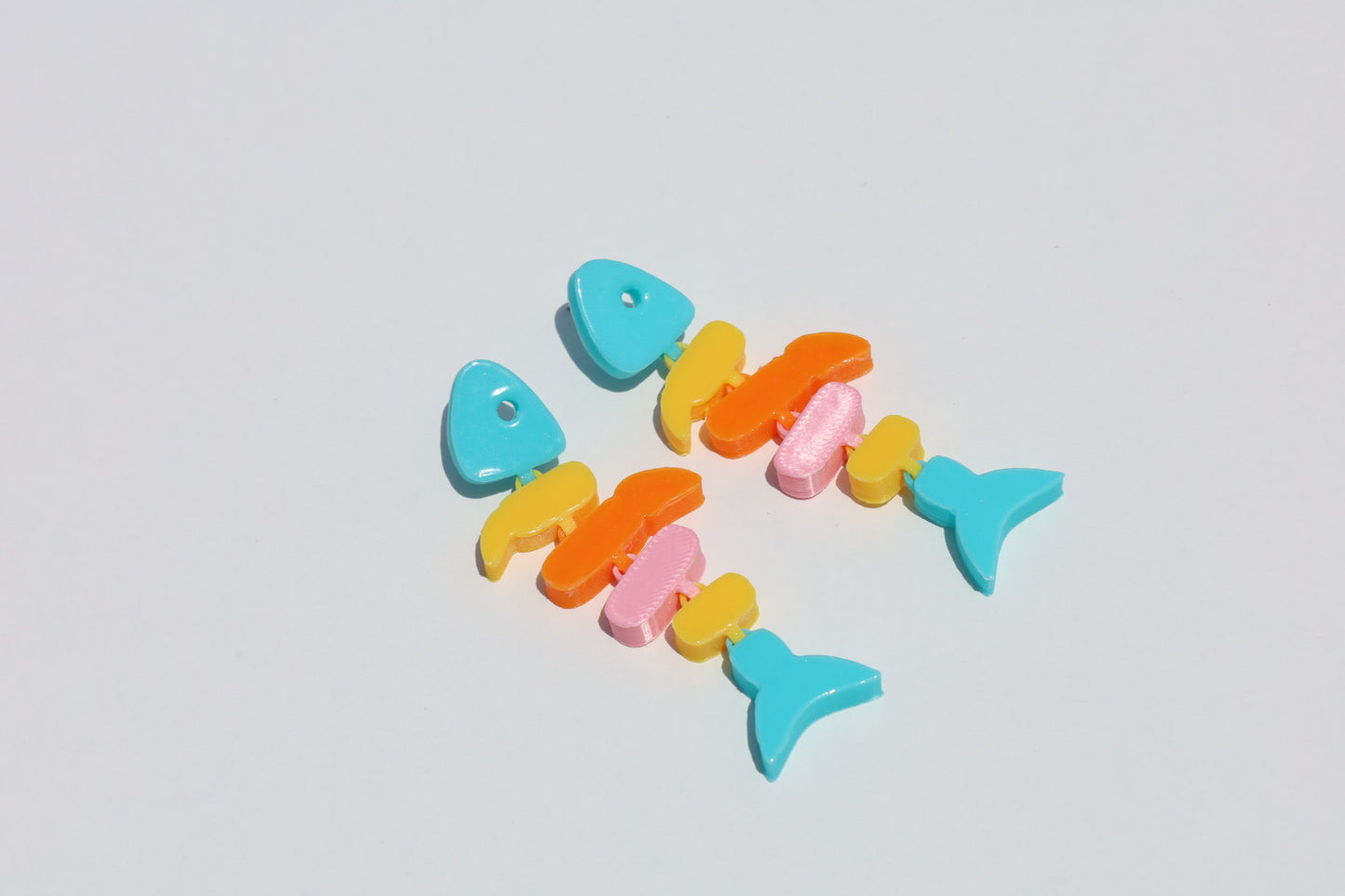 Color pop fish earrings